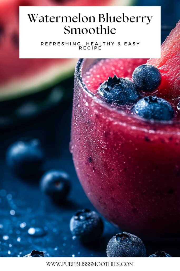 Close-up of a frosty watermelon blueberry smoothie, topped with fresh blueberries and a slice of watermelon. The vibrant red and blue colors highlight the smoothie’s refreshing and healthy nature. The text overlay promotes the recipe as 'Refreshing, Healthy & Easy,' making it an enticing option for a cool, fruity treat.